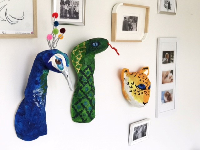 Peacock, cobra and leopard paper mache heads